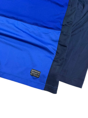 Kék-fekete vintage Nike streetwear póló, authentikus címkével, limitált kiadás