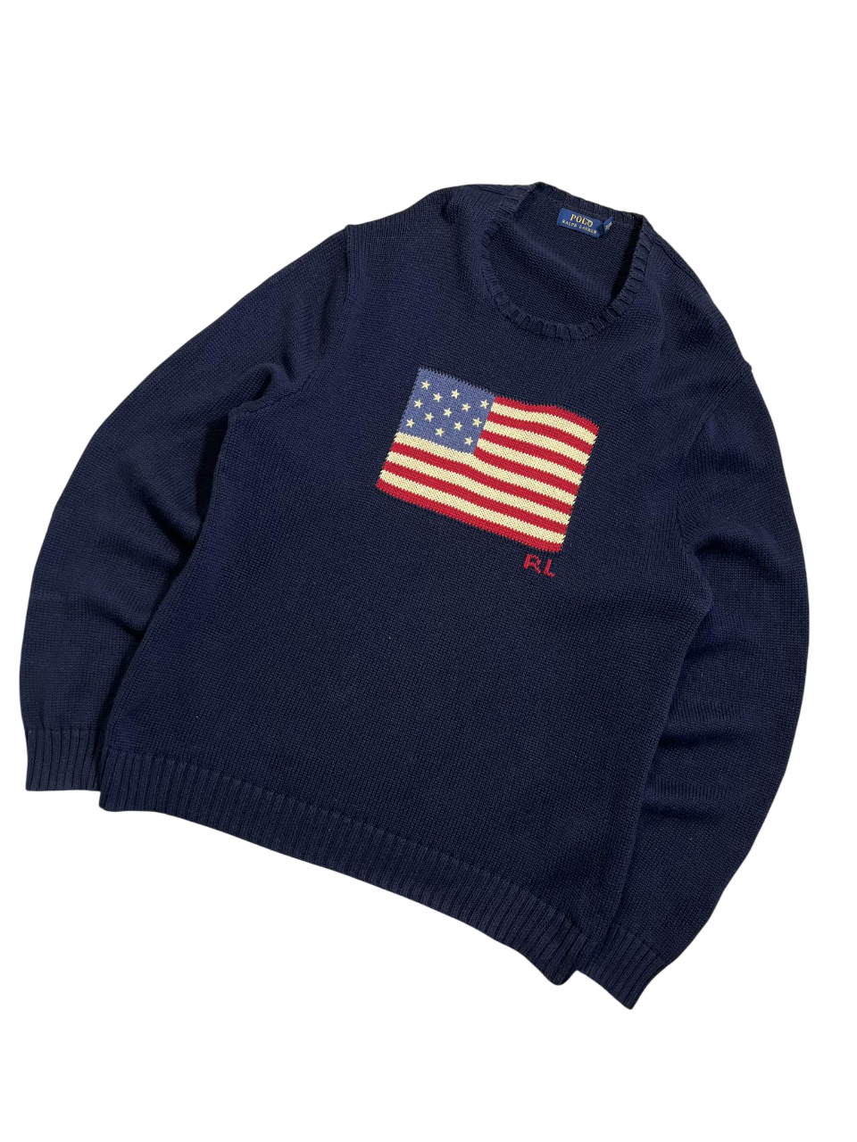 Sötétkék vintage pulóver, elöl amerikai zászló mintával, prémium streetwear stílusban.