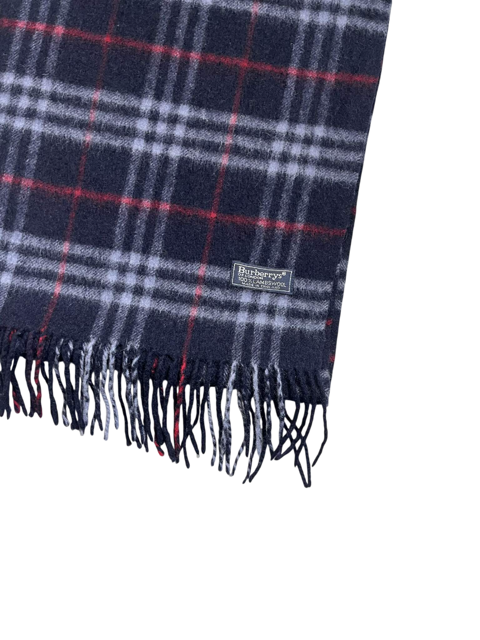 Klasszikus kockás gyapjúsál sötétkék, fehér és piros mintával, bojtos széllel